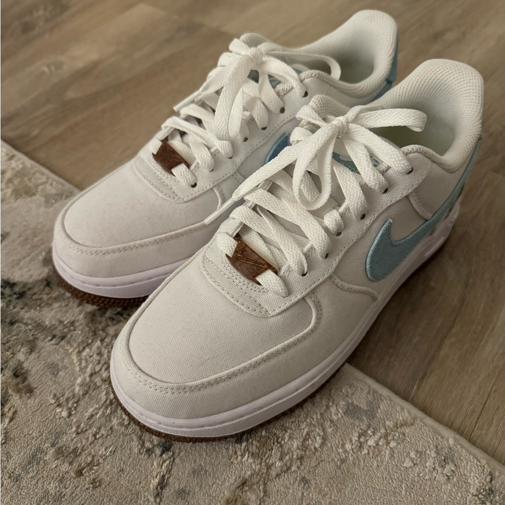 White and light blue Nike Sneakers
